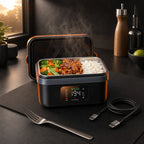 Full-frame square campaign product portrait with no text zone. The ELYO ESSENTIAL lunchbox, open wit
